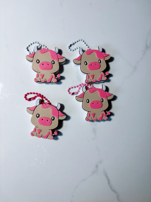 cow can opener keychain